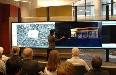 Robert Bryant, an M.A. student in the Anthropology department at GSU, presents a 3D recreation of a 1920s storefront on CURVE’s interactWall, an LCD visualization wall built by Haivision.
